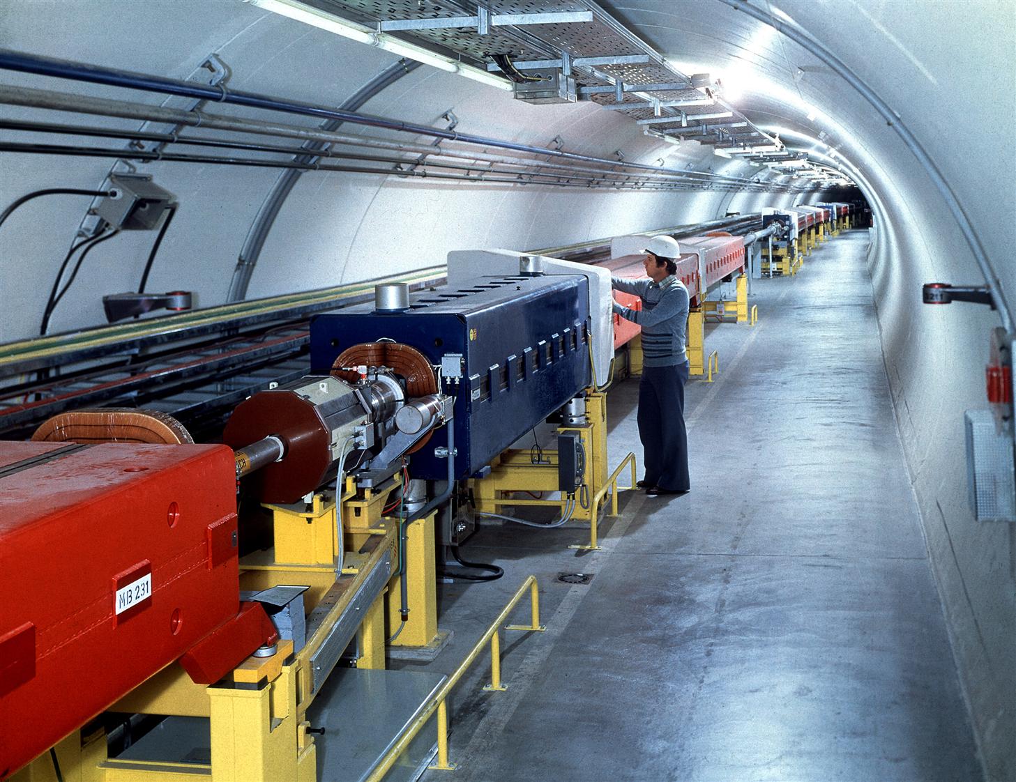 The Super Proton Synchrotron (SPS) tunnel. Particle beams enter the SPS at 26 GeV, which then accelerates the beam up to 450 GeV. (Image: CERN)