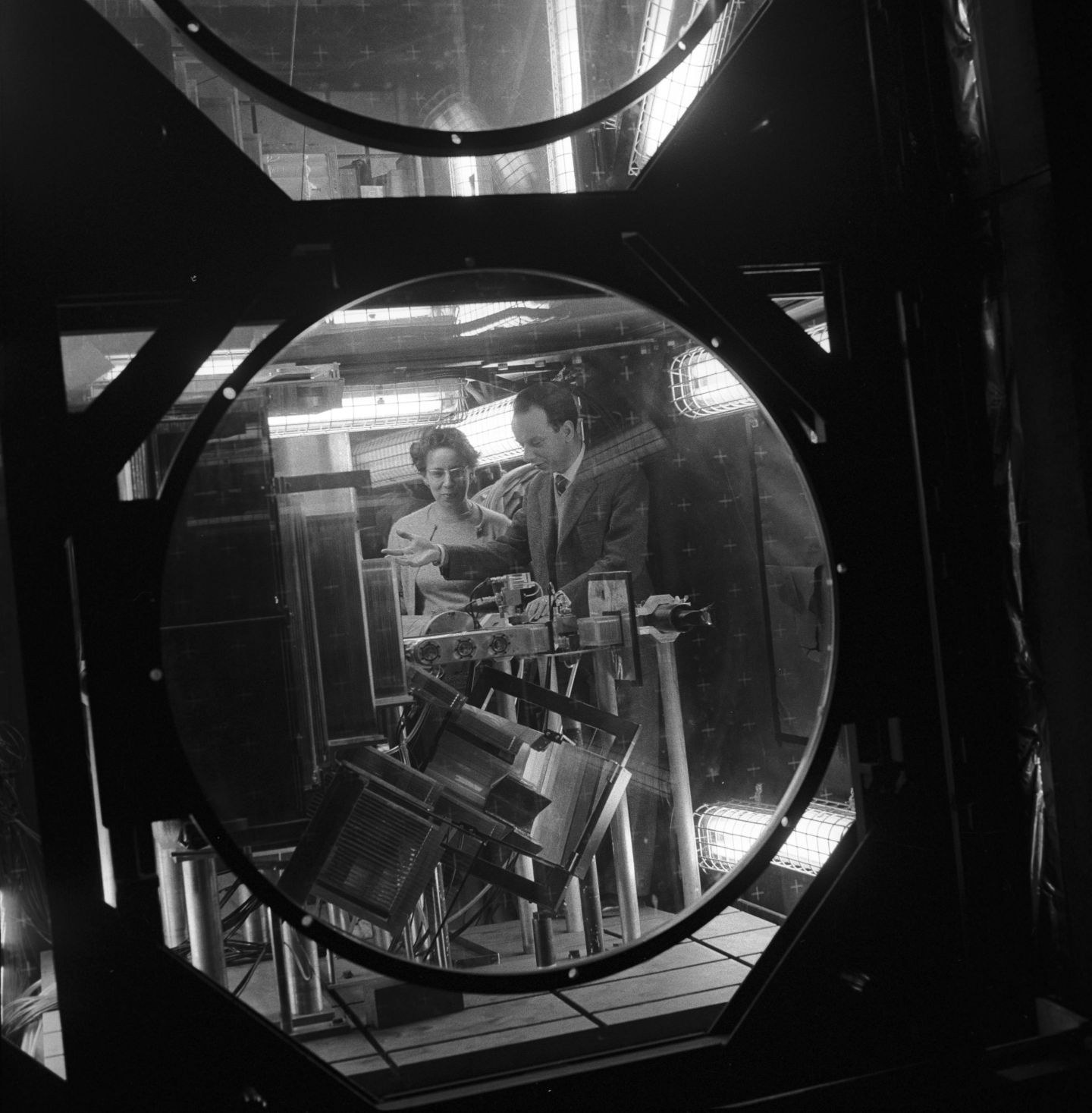 Giuseppe Fidecaro, who was part of the team that made CERN’s first discovery, is pictured here some years later with Maria Fidecaro, as they carry out an experiment at CERN’s second accelerator. (Image: CERN)