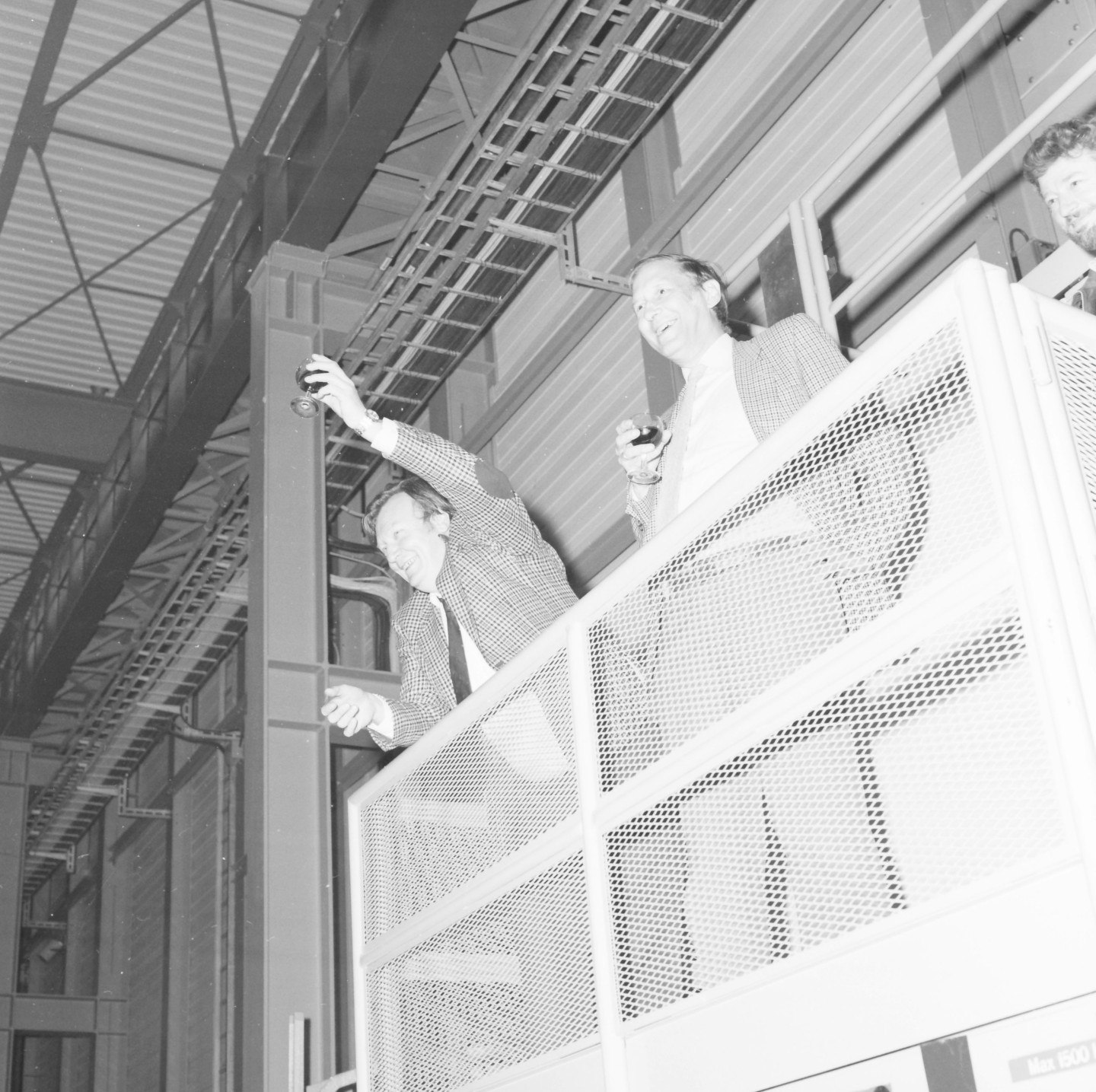 Simon van der Meer and Carlo Rubbia celebrate their award of the Nobel Prize in 1984 with a toast at CERN.